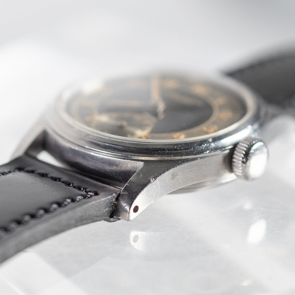 TAVANNES Bulls eye Black Gilt Dial