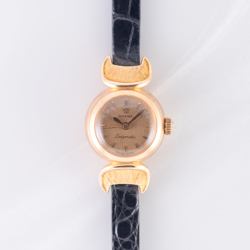 OMEGA