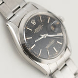 ROLEX OYSTER PERPETUAL DATE Ref.1500 Black Gilt Dial