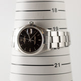 ROLEX OYSTER PERPETUAL DATE Ref.1500 Black Gilt Tropical Dial