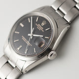 ROLEX OYSTER PERPETUAL DATE Ref.1500 Black Gilt Tropical Dial