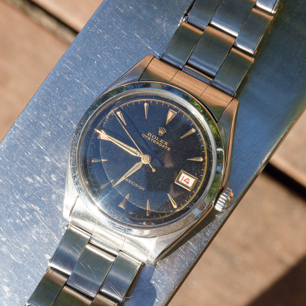 ROLEX OYSTERDATE Black Gilt Debossed Dial Ref.6294