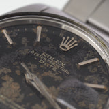 ROLEX OYSTER PERPETUAL DATE REF.1500 BLACK GILT PATINA DIAL