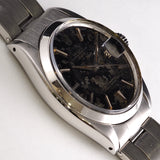 ROLEX OYSTER PERPETUAL DATE REF.1500 BLACK GILT PATINA DIAL