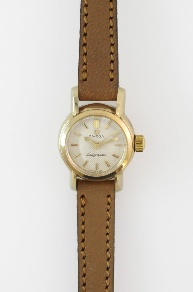 OMEGA