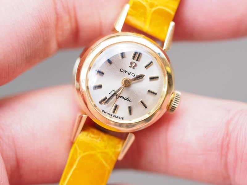 OMEGA
