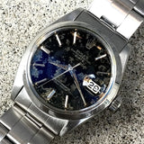 ROLEX OYSTER PERPETUAL DATE REF.1500 BLACK GILT PATINA DIAL