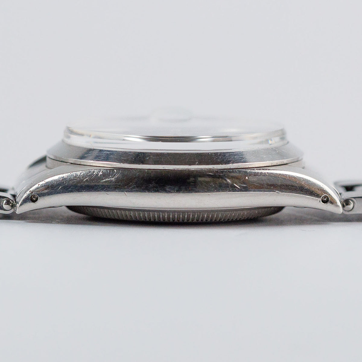 ROLEX OYSTER PERPETUAL DATE Ref.1500 Black Gilt Patina Dial
