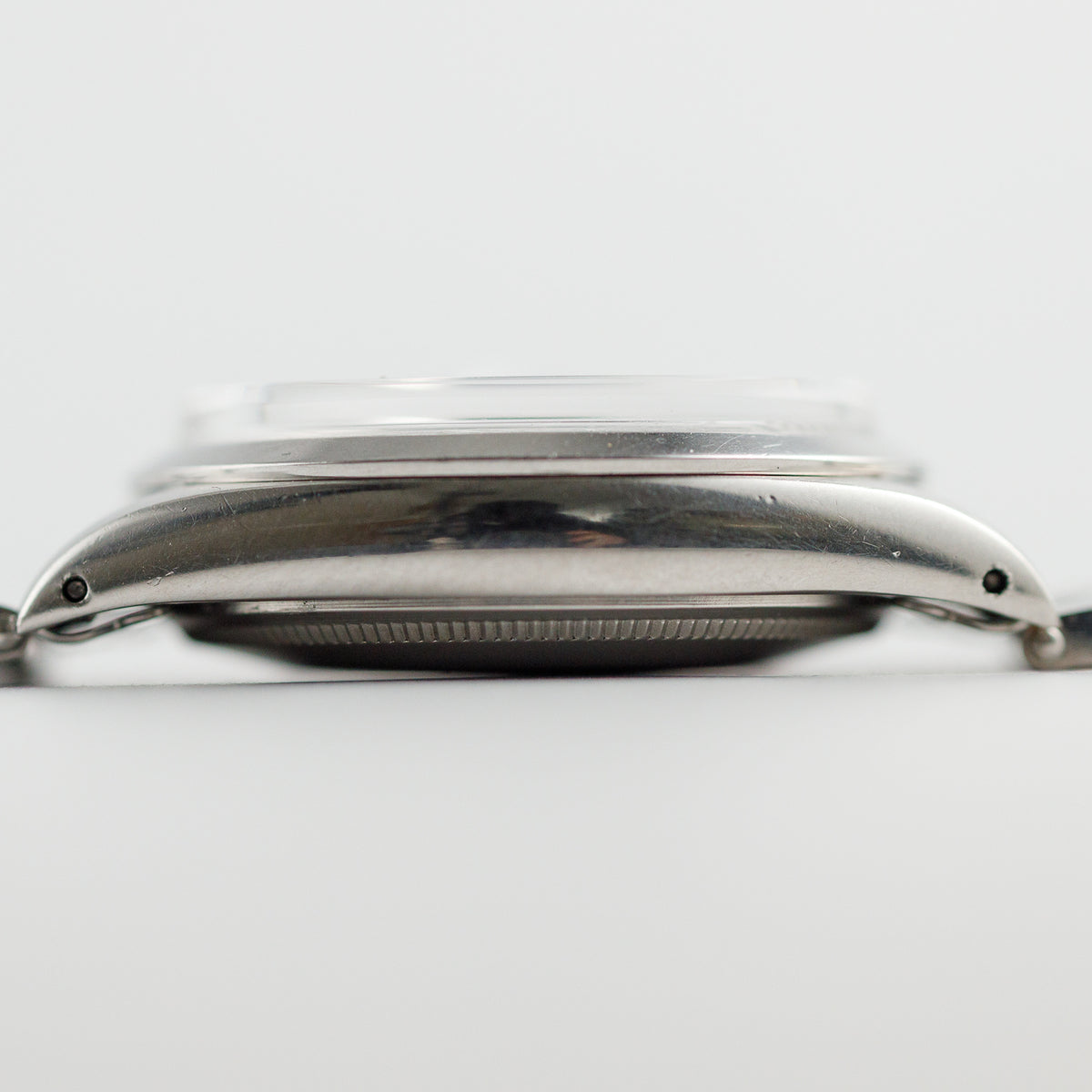 ROLEX OYSTER PERPETUAL DATE Ref.1500 Black Gilt Patina Dial