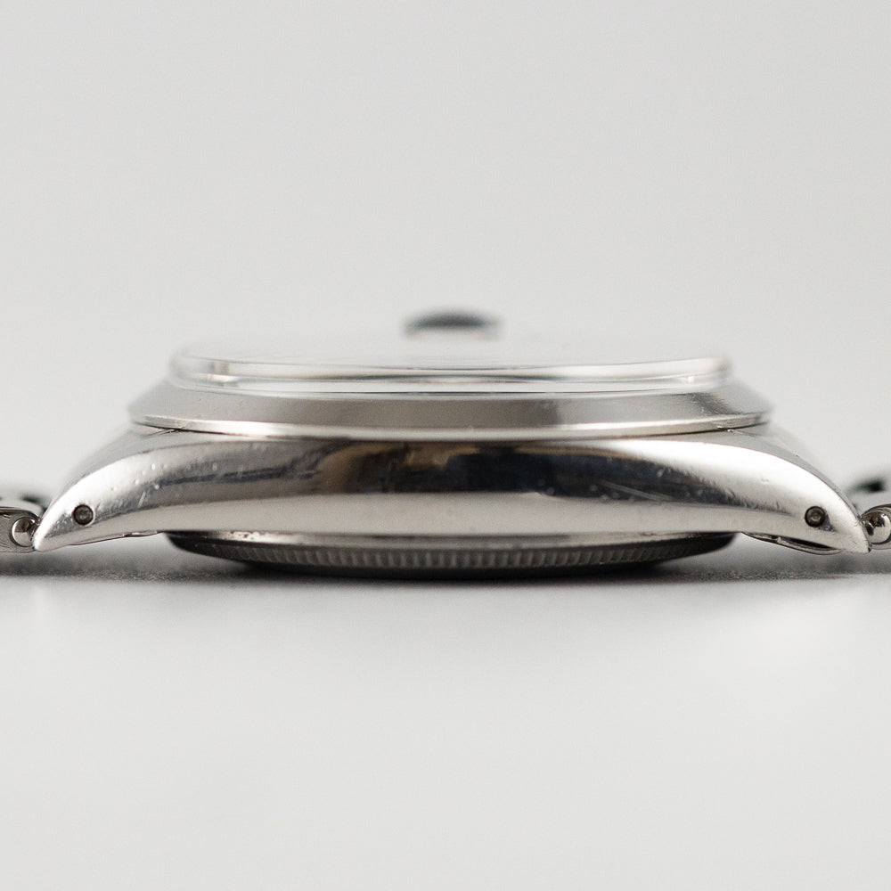 ROLEX OYSTER PERPETUAL DATE Ref.1500 Black Gilt Patina Dial