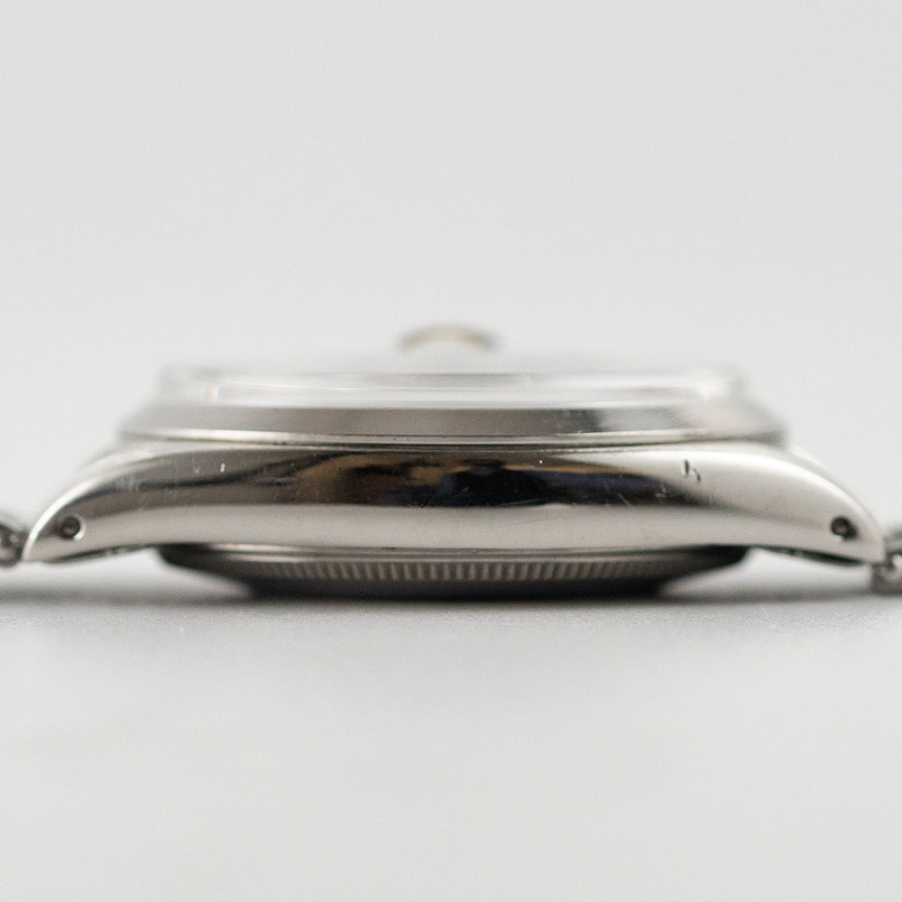ROLEX OYSTER PERPETUAL DATE Ref.1500 Black Gilt Dial