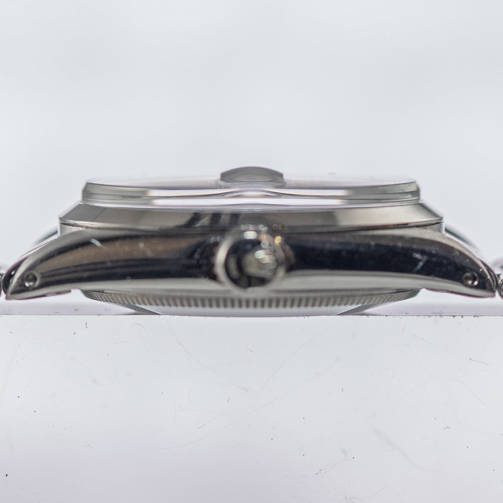 ROLEX OYSTER PERPETUAL DATE Ref.1500 Black Gilt Dial
