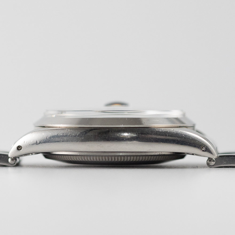 ROLEX OYSTER PERPETUAL DATE Ref.1500 Black Gilt Dial