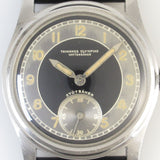 TAVANNES Bulls eye Black Gilt Dial