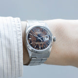 ROLEX OYSTER PERPETUAL DATE REF.1500 BLACK GILT PATINA DIAL