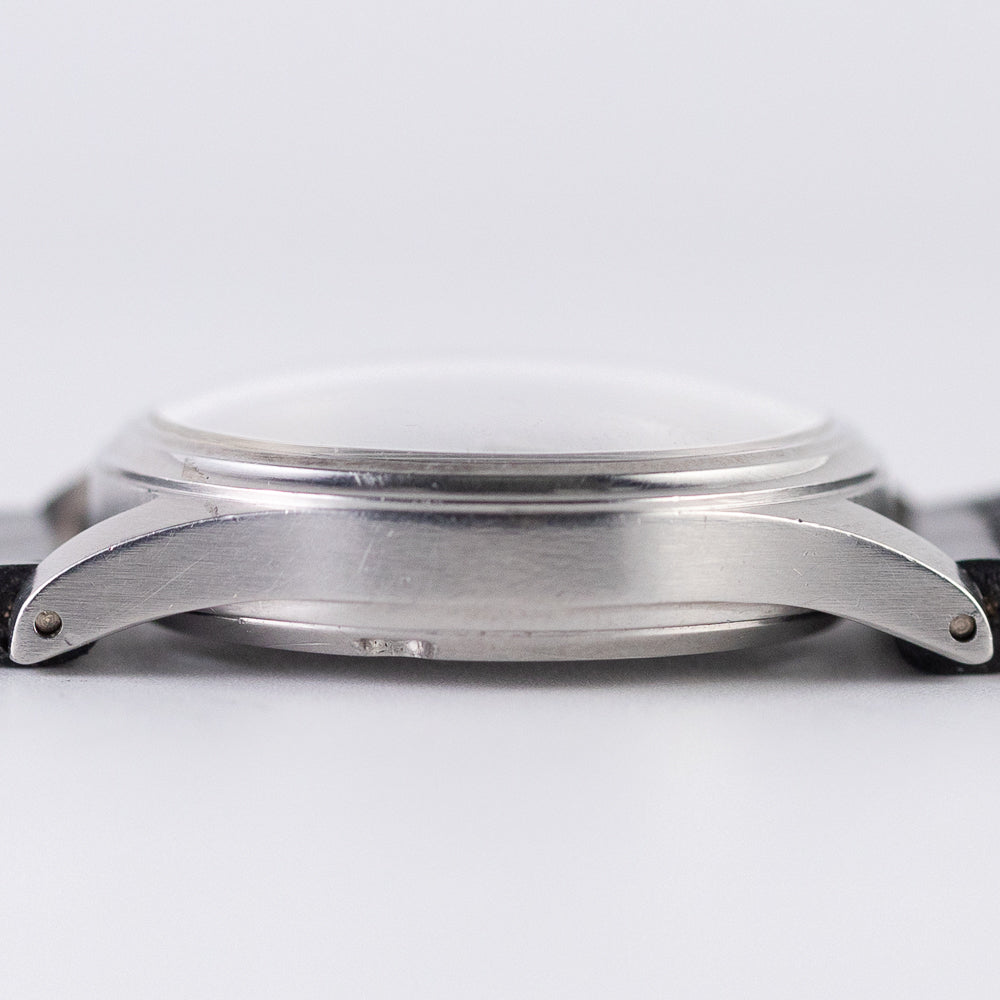 TAVANNES Bulls eye Black Gilt Dial
