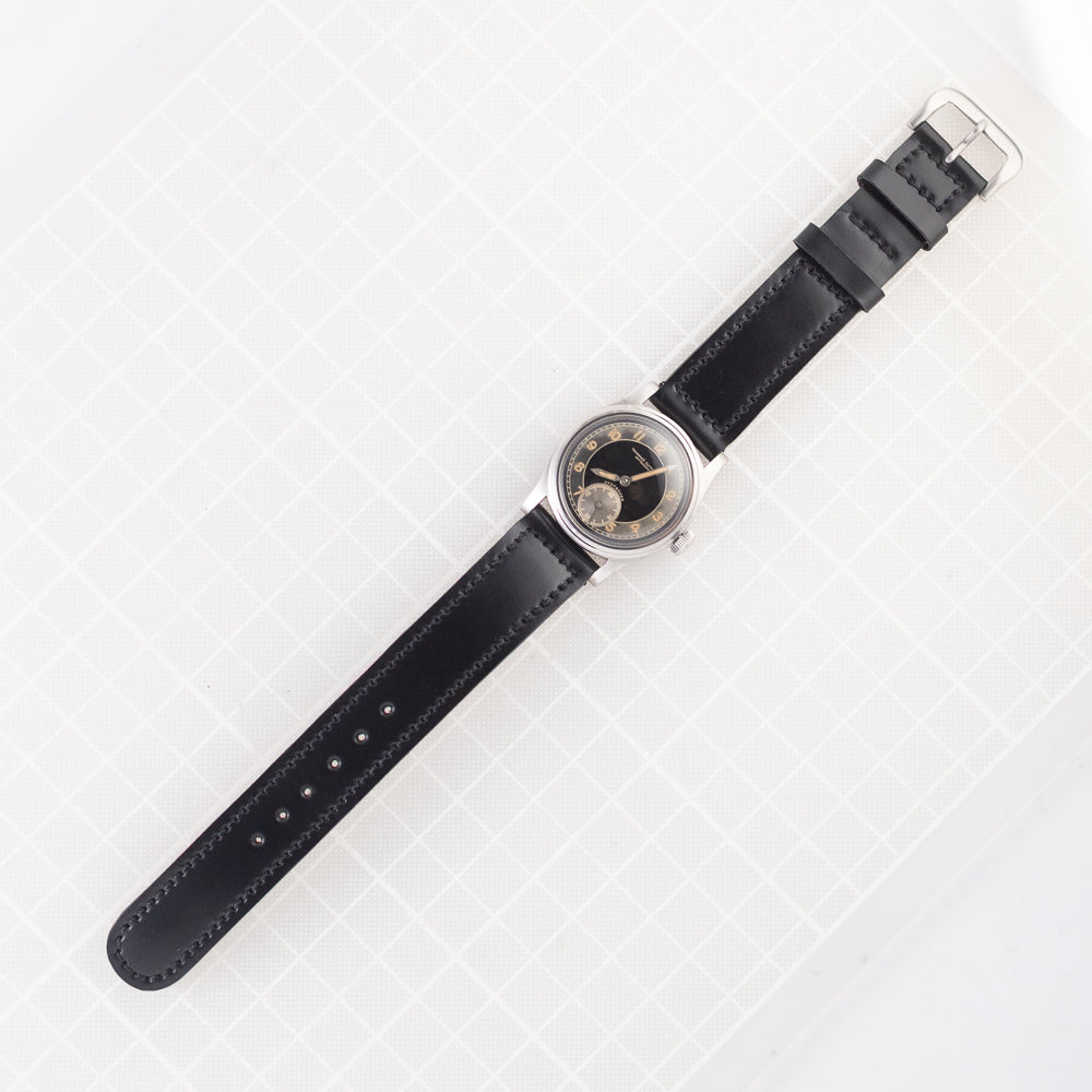 TAVANNES Bulls eye Black Gilt Dial