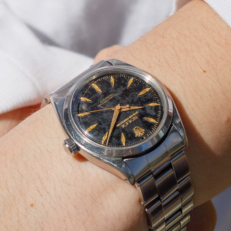 ROLEX OYSTER PERPETUAL Ref.6564 Black Gilt Dial