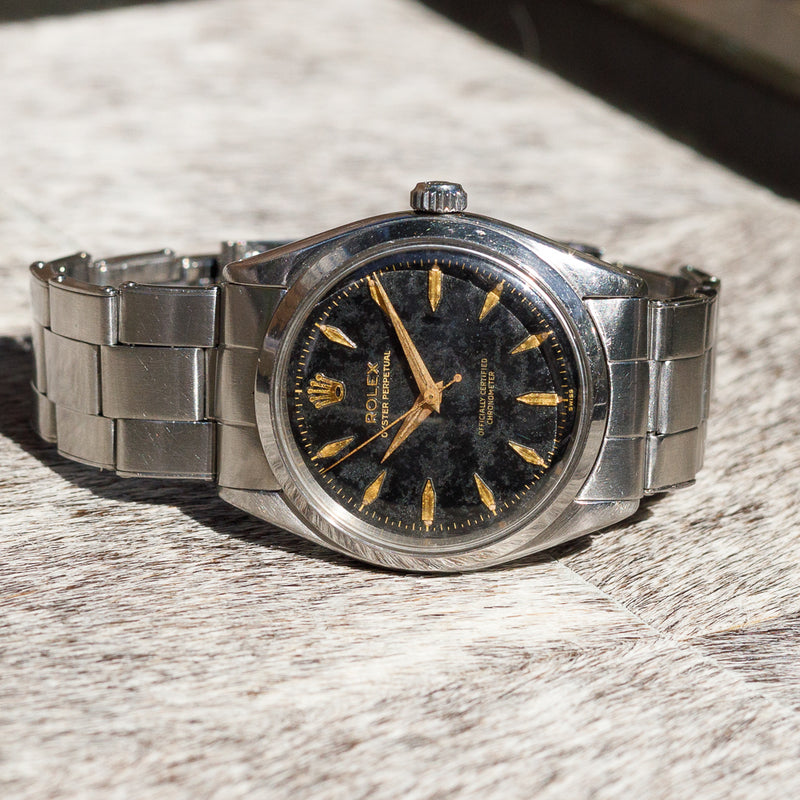 ROLEX OYSTER PERPETUAL Ref.6564 Black Gilt Dial