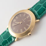 CORUM Ref.8781 Oval 18K Yellow Gold Brown Linen Dial