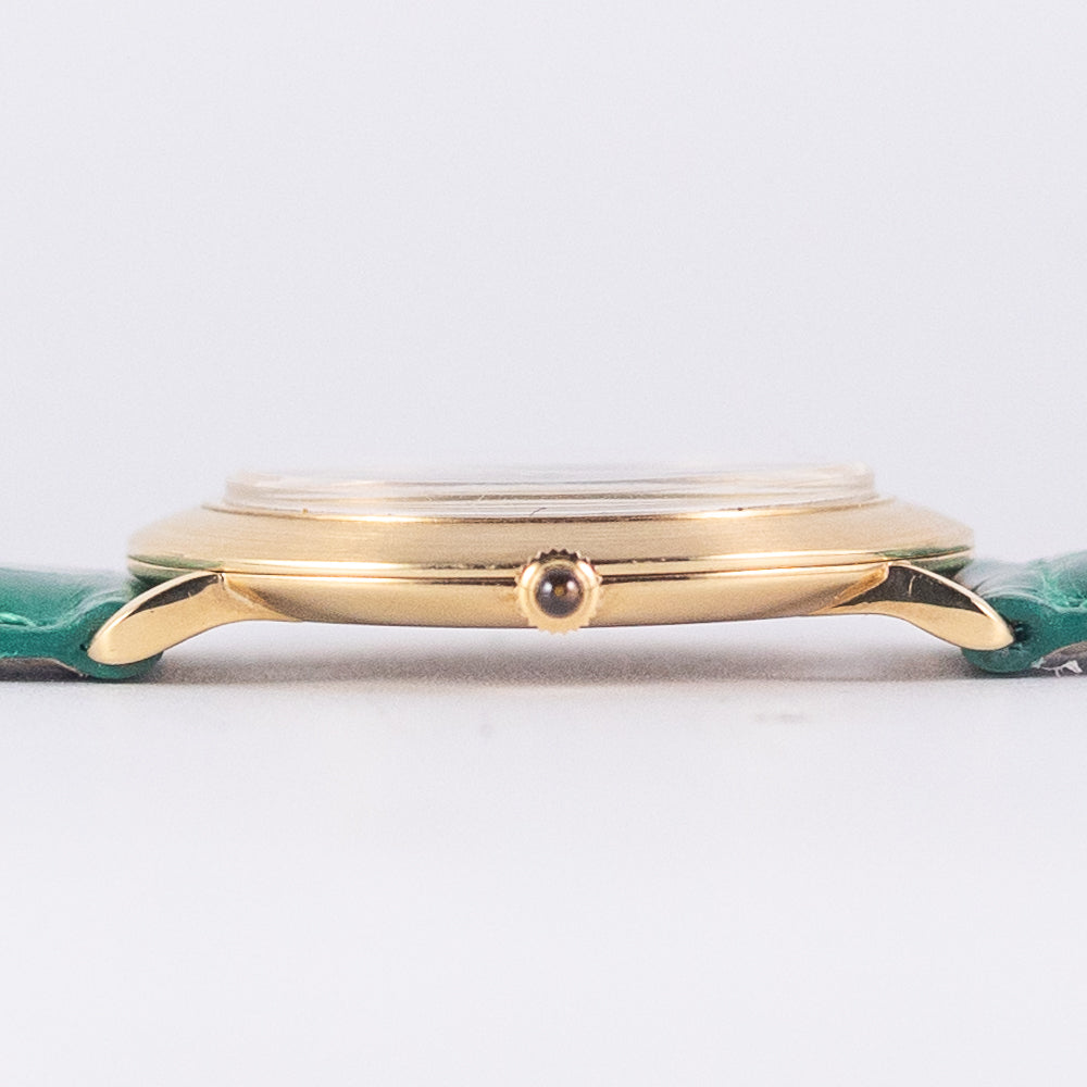 CORUM Ref.8781 Oval 18K Yellow Gold Brown Linen Dial – TIMEANAGRAM