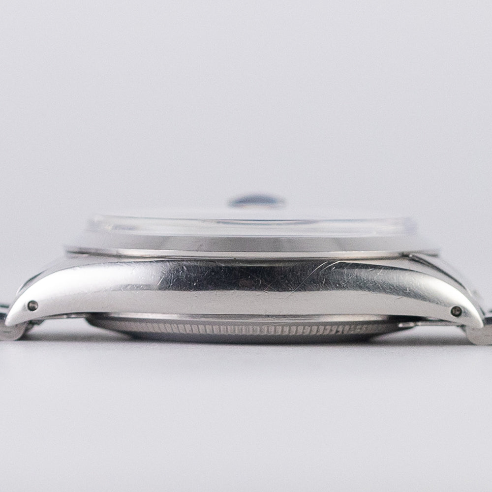 ROLEX OYSTER PERPETUAL DATE Ref.1500 Black Gilt Dial