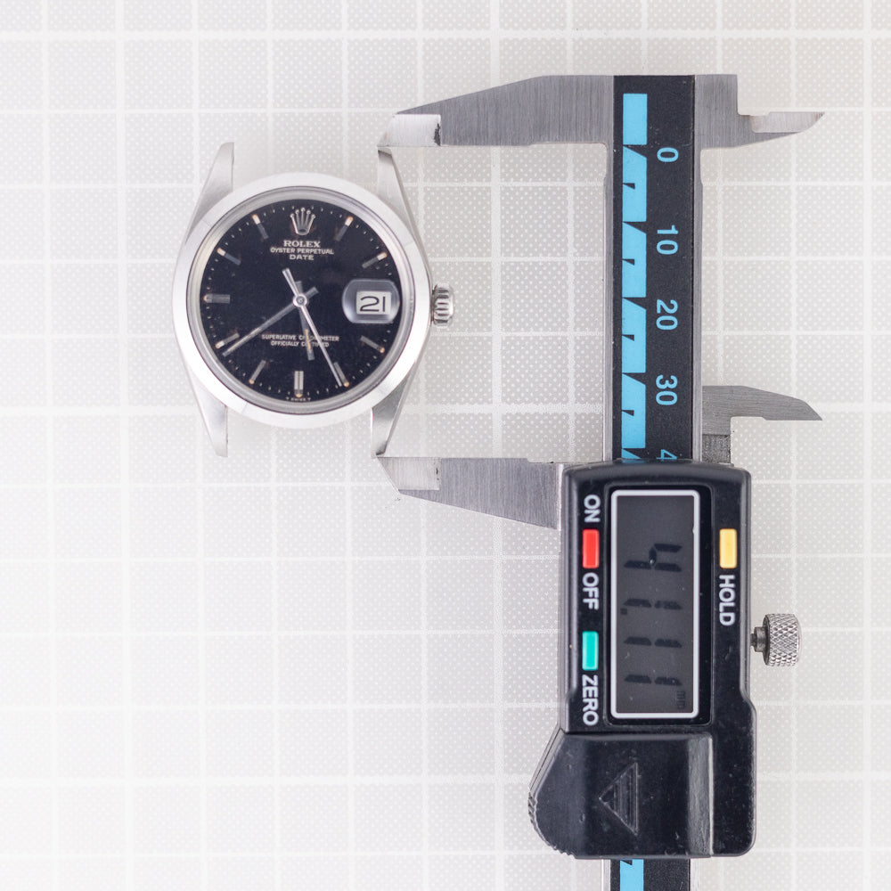 ROLEX OYSTER PERPETUAL DATE Ref.1500 Black Gilt Dial