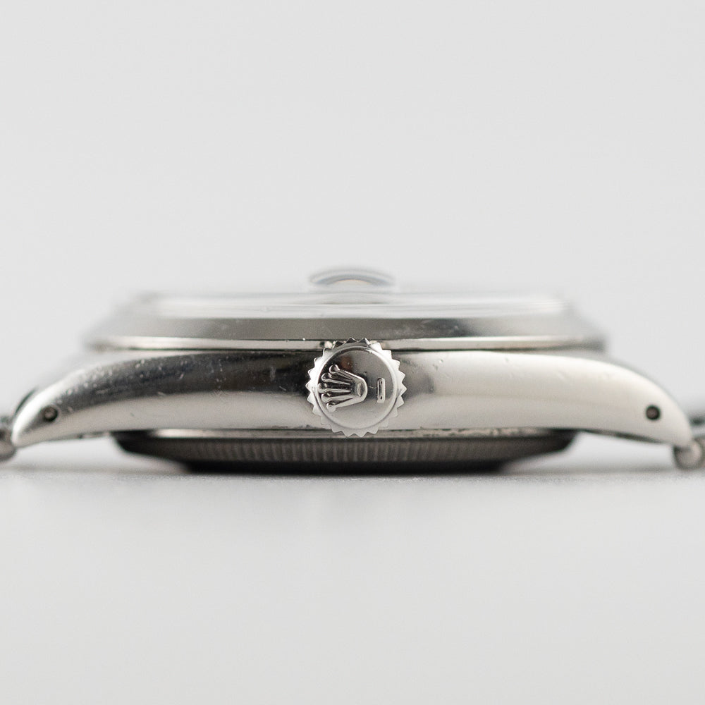 ROLEX OYSTER PERPETUAL DATE Ref.1500 Black Gilt Dial