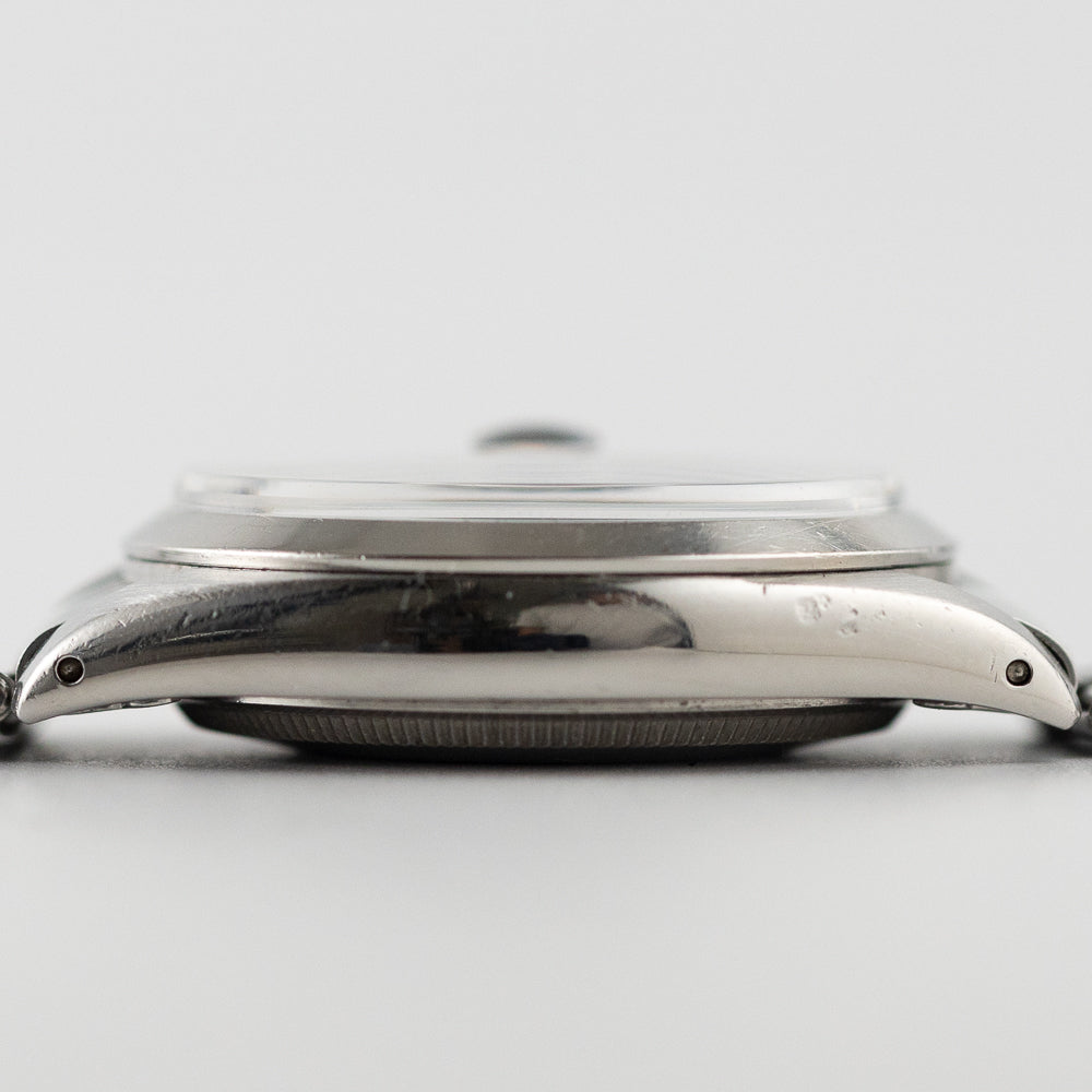 ROLEX OYSTER PERPETUAL DATE Ref.1500 Black Gilt Dial