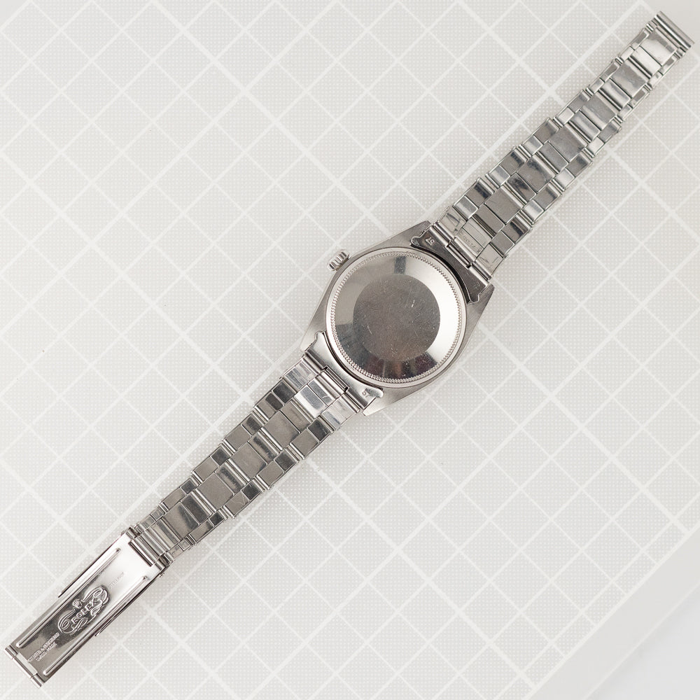 ROLEX OYSTER PERPETUAL DATE Ref.1500 Black Gilt Tropical Dial