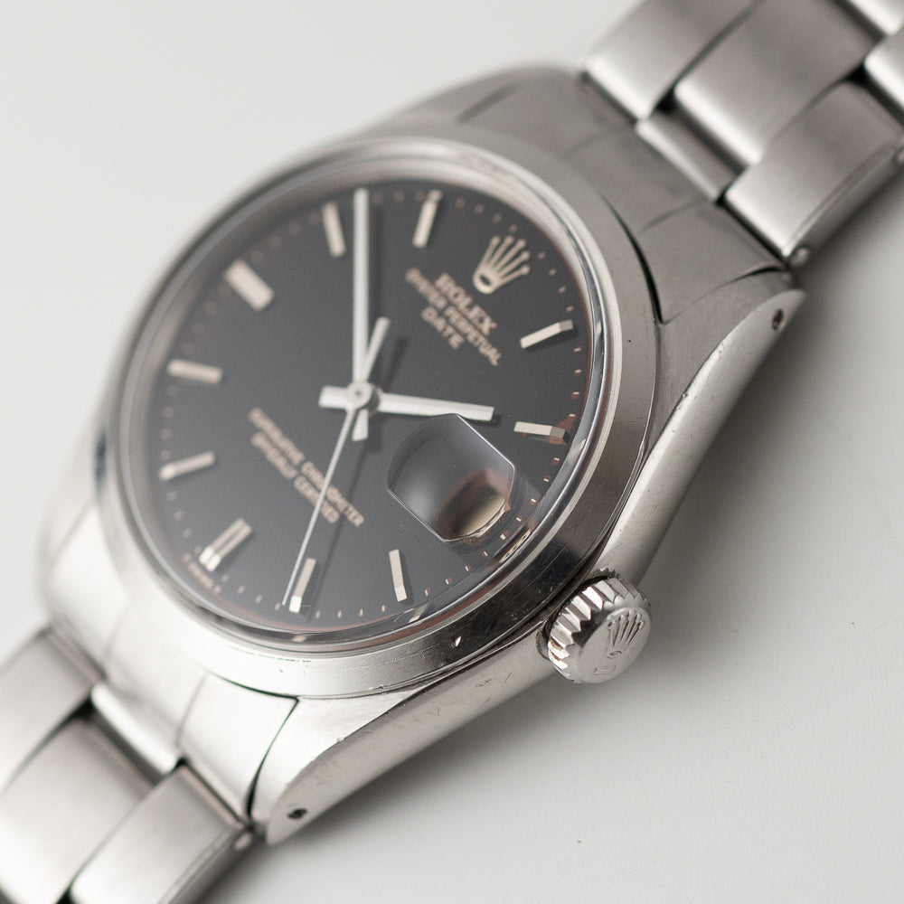 ROLEX OYSTER PERPETUAL DATE Ref.1500 Black Gilt Tropical Dial