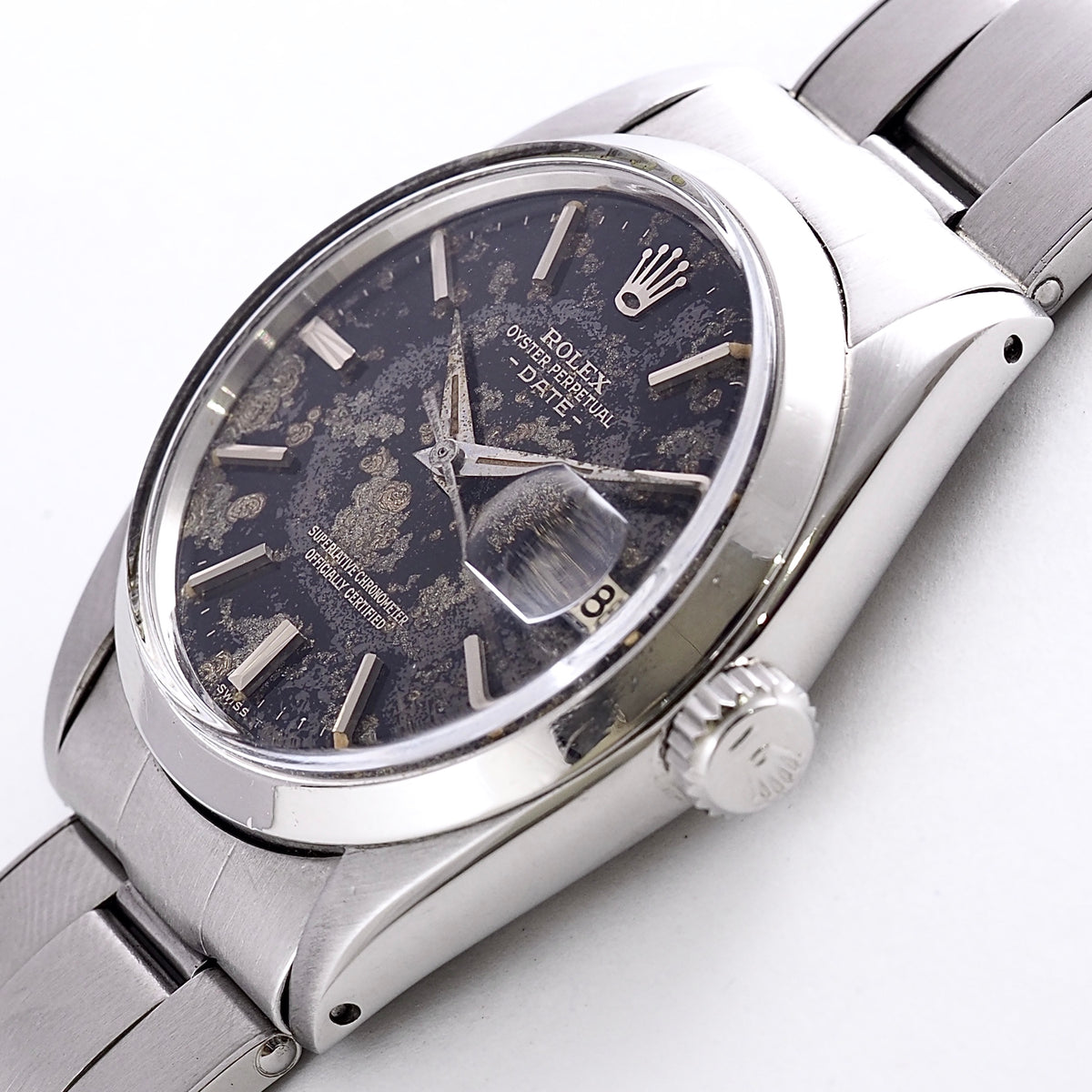 ROLEX OYSTER PERPETUAL DATE REF.1500 BLACK GILT PATINA DIAL