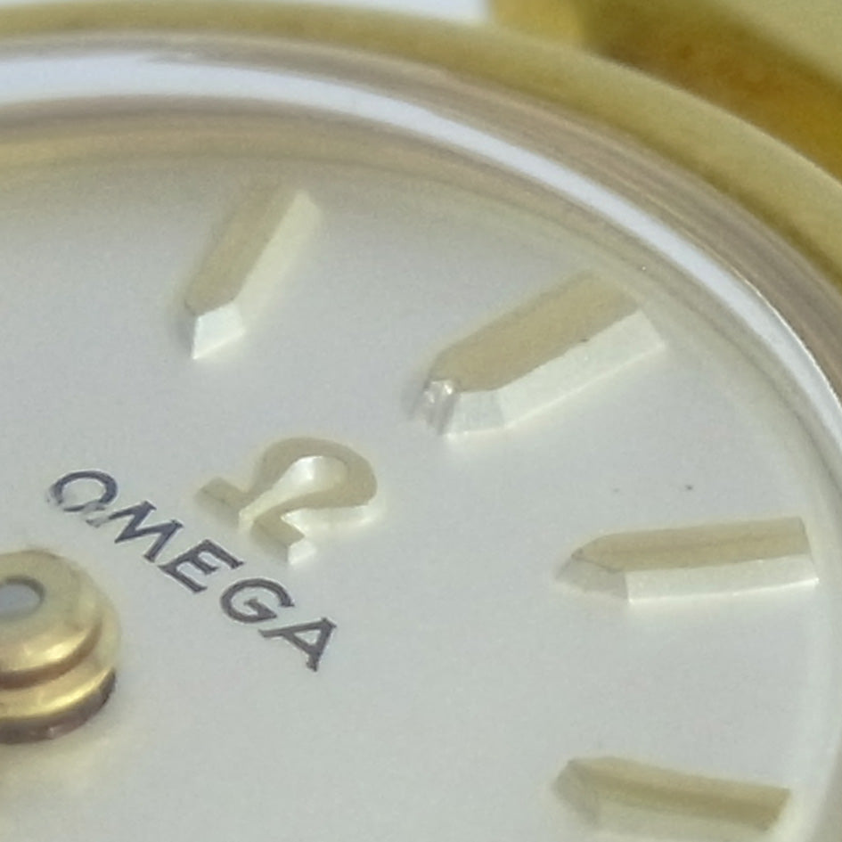 OMEGA