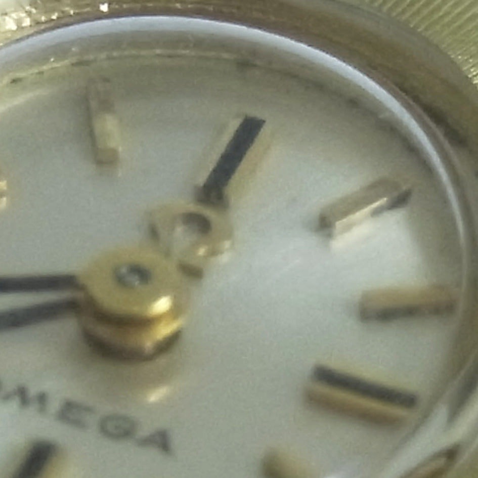 OMEGA