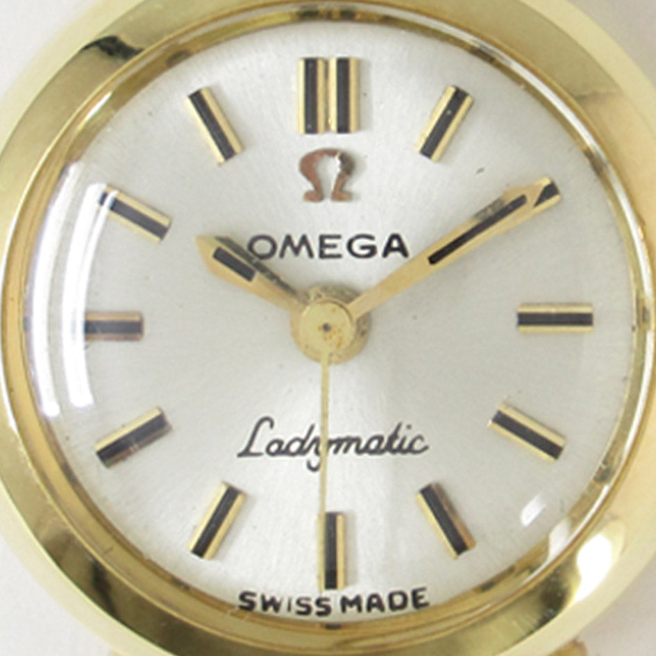 OMEGA