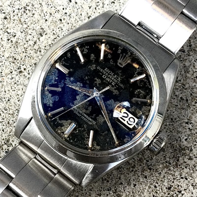 ROLEX OYSTER PERPETUAL DATE REF.1500 BLACK GILT PATINA DIAL