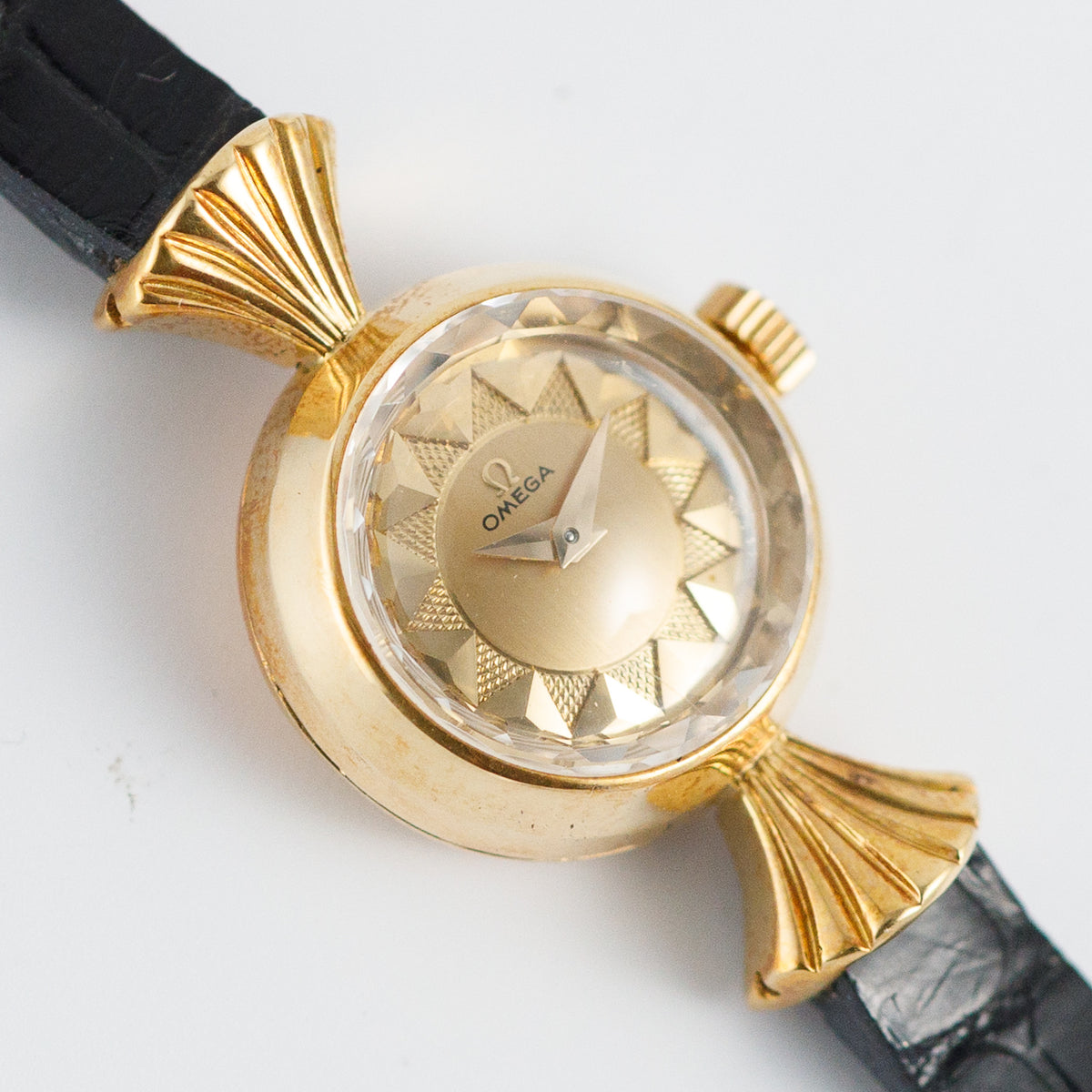 OMEGA