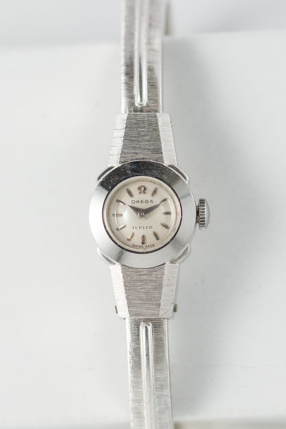 OMEGA