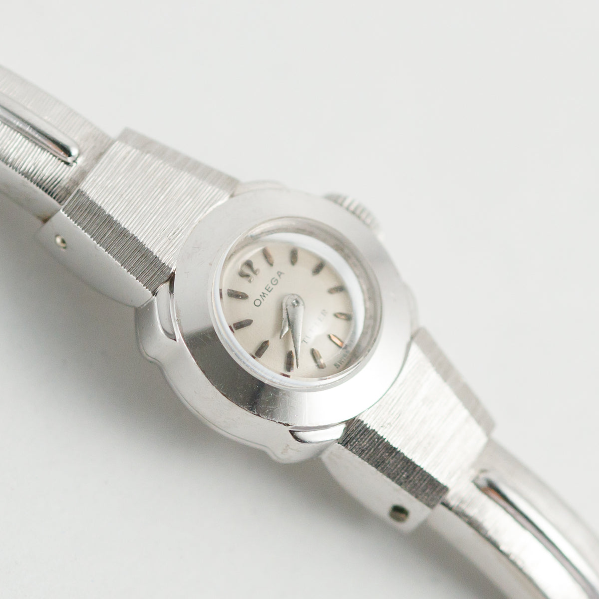 OMEGA