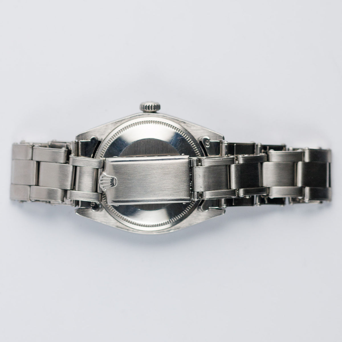 ROLEX OYSTER PERPETUAL DATE REF.1500 BLACK GILT PATINA DIAL
