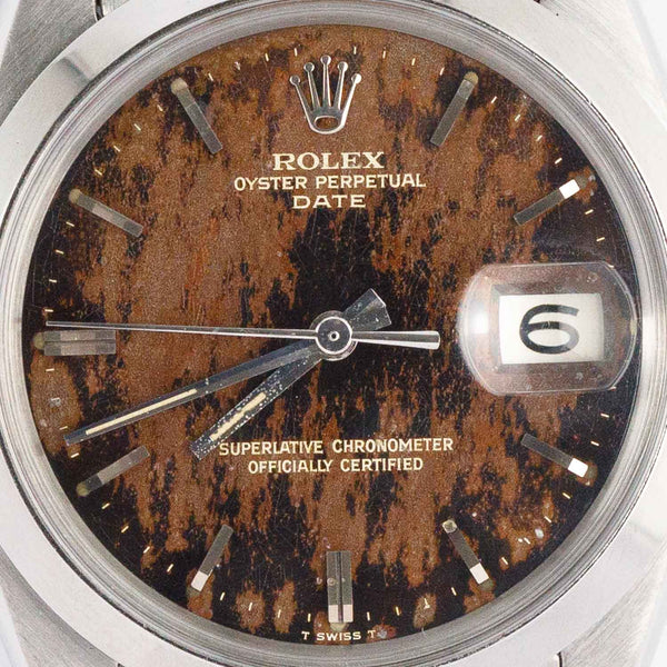 ROLEX OYSTER PERPETUAL DATE REF.1500 BLACK GILT PATINA DIAL