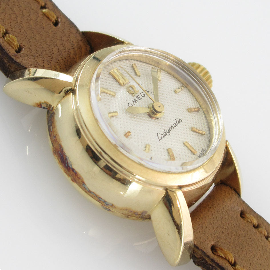 OMEGA