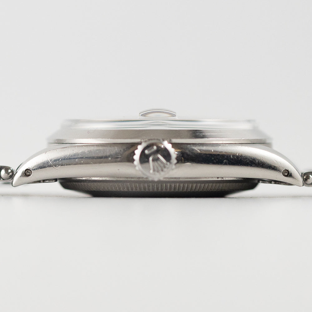 ROLEX OYSTER PERPETUAL DATE Ref.1500 Black Gilt Patina Dial