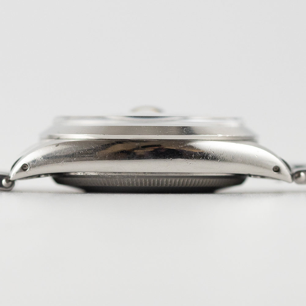 ROLEX OYSTER PERPETUAL DATE Ref.1500 Black Gilt Patina Dial