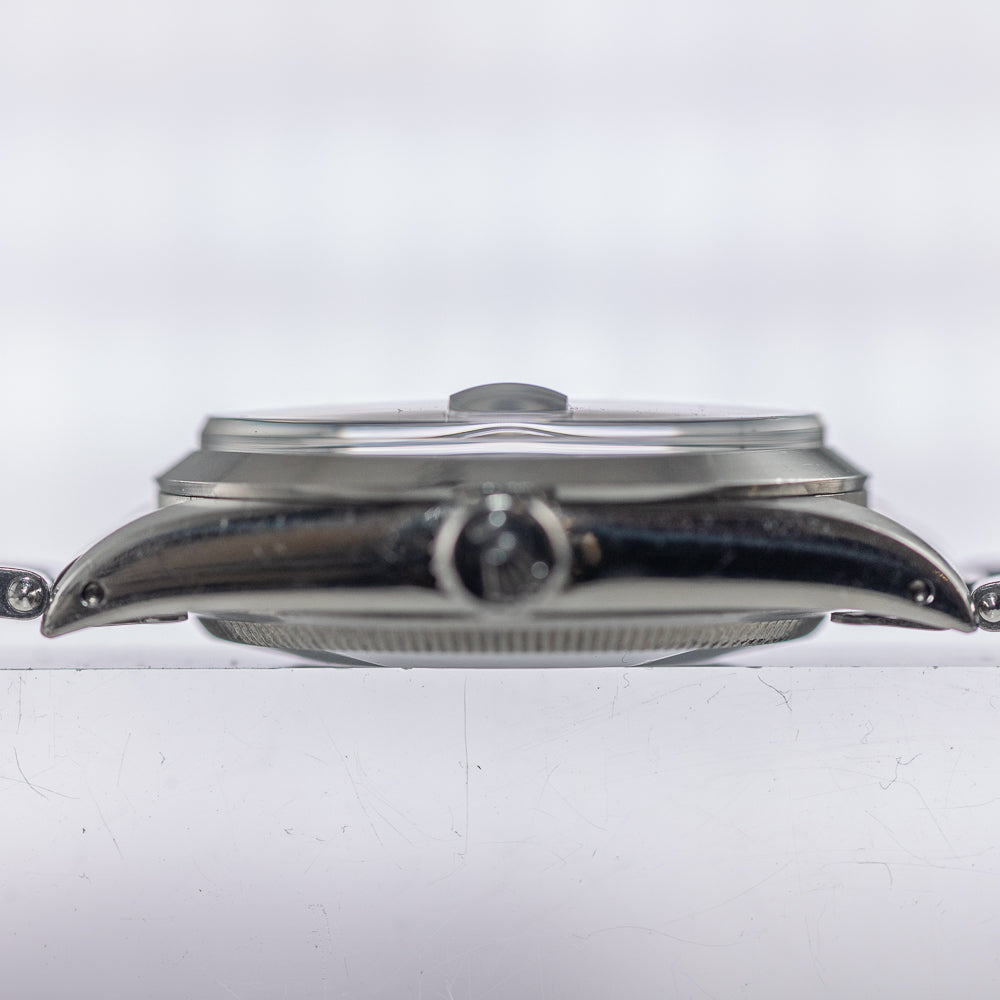 ROLEX OYSTER PERPETUAL DATE Ref.1500 Black Gilt Patina Dial