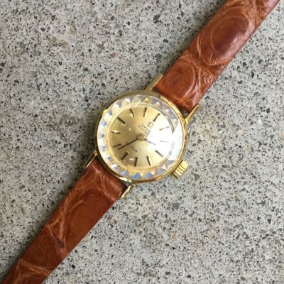 OMEGA