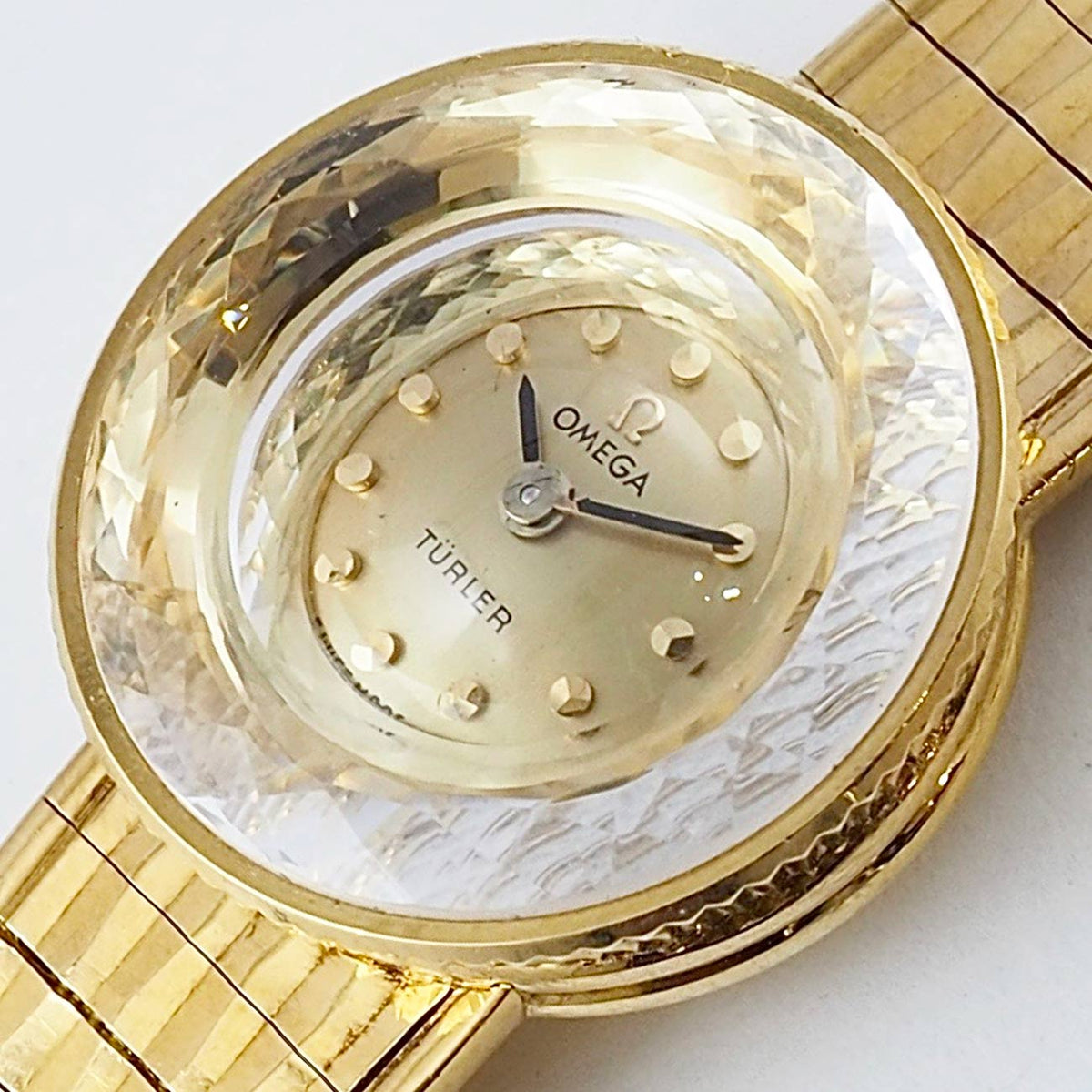 OMEGA