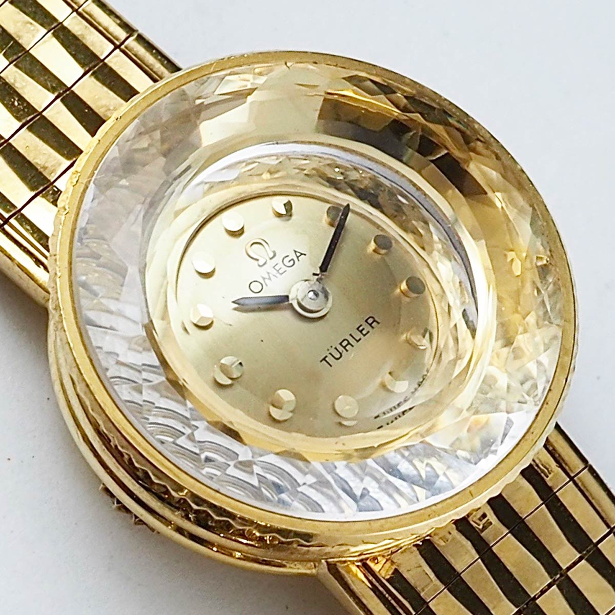 OMEGA