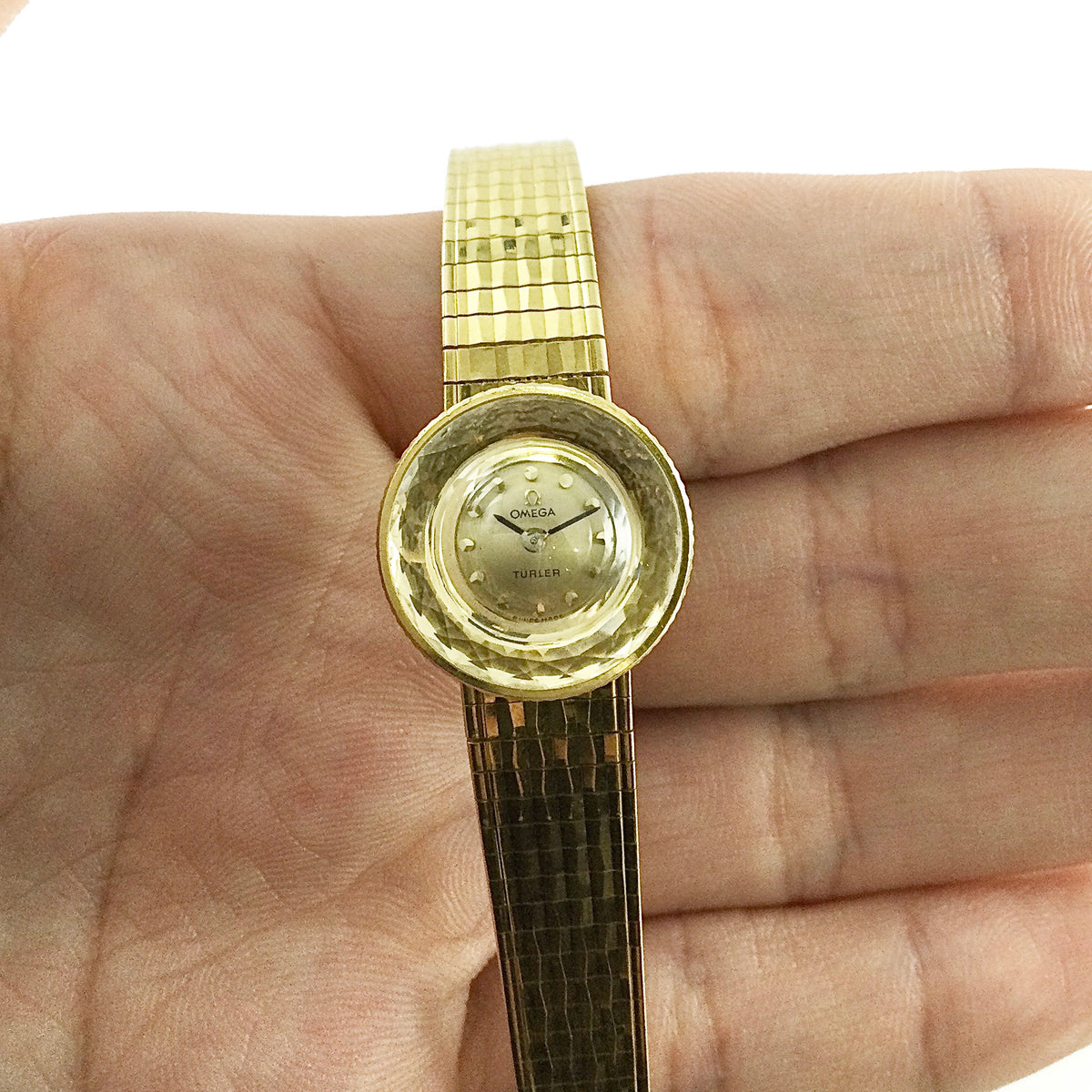 OMEGA